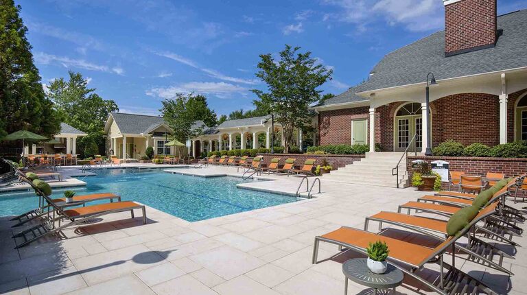 Resort-Inspired Pool with Expansive Sundeck and Lounge Seating